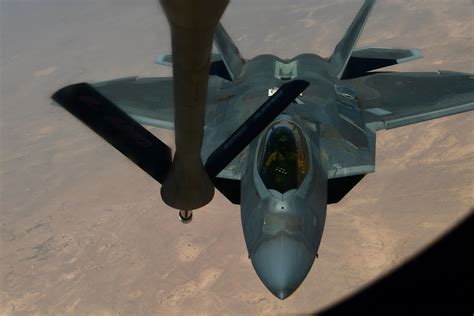 A F 22 Raptor Snuck Right Underneath An Iranian Fighter Jet The