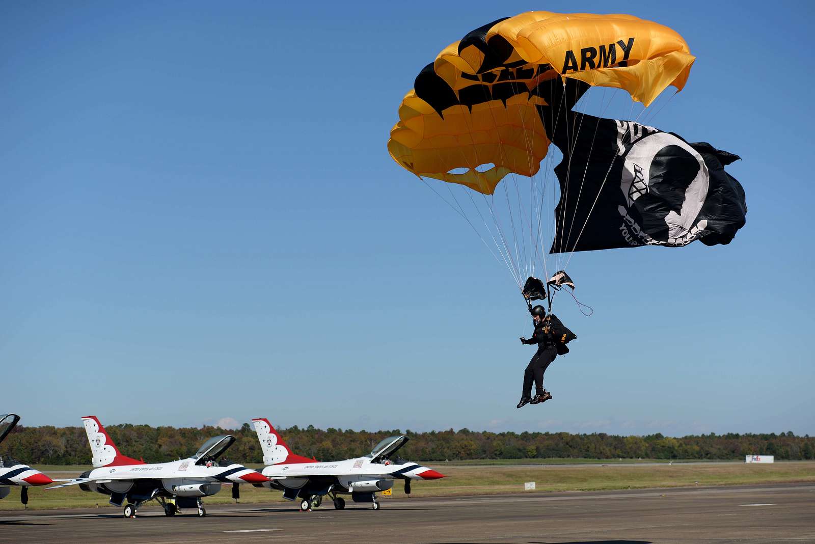 A Member Of The U S Army Golden Knights Carries The Nara Dvids