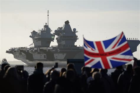 Families And Friends Welcome Aircraft Carrier Hms Prince Of Wales Home