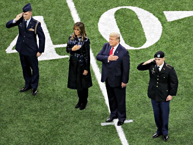 Fans Cheer Trump As He Attends College Football Championship Game