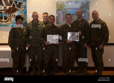 Navy Petty Officers 1St Class Joel Grepo Center Left And 3Rd Class