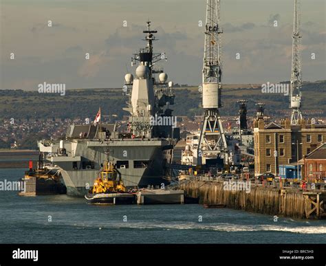 Royal Navy Aircraft Carrier In Portsmouth Harbour Hampshire England Uk