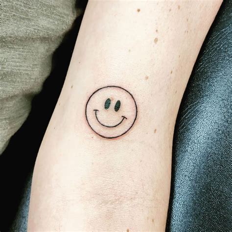 Smiley Face Tattoo On Face