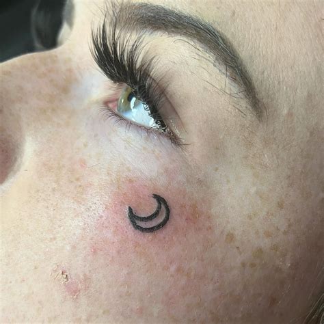 Symbol Small Face Tattoos